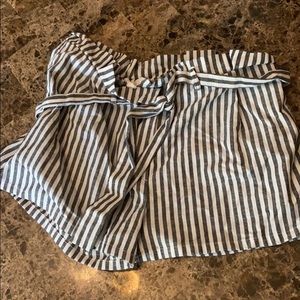 Black and white striped shorts with belt